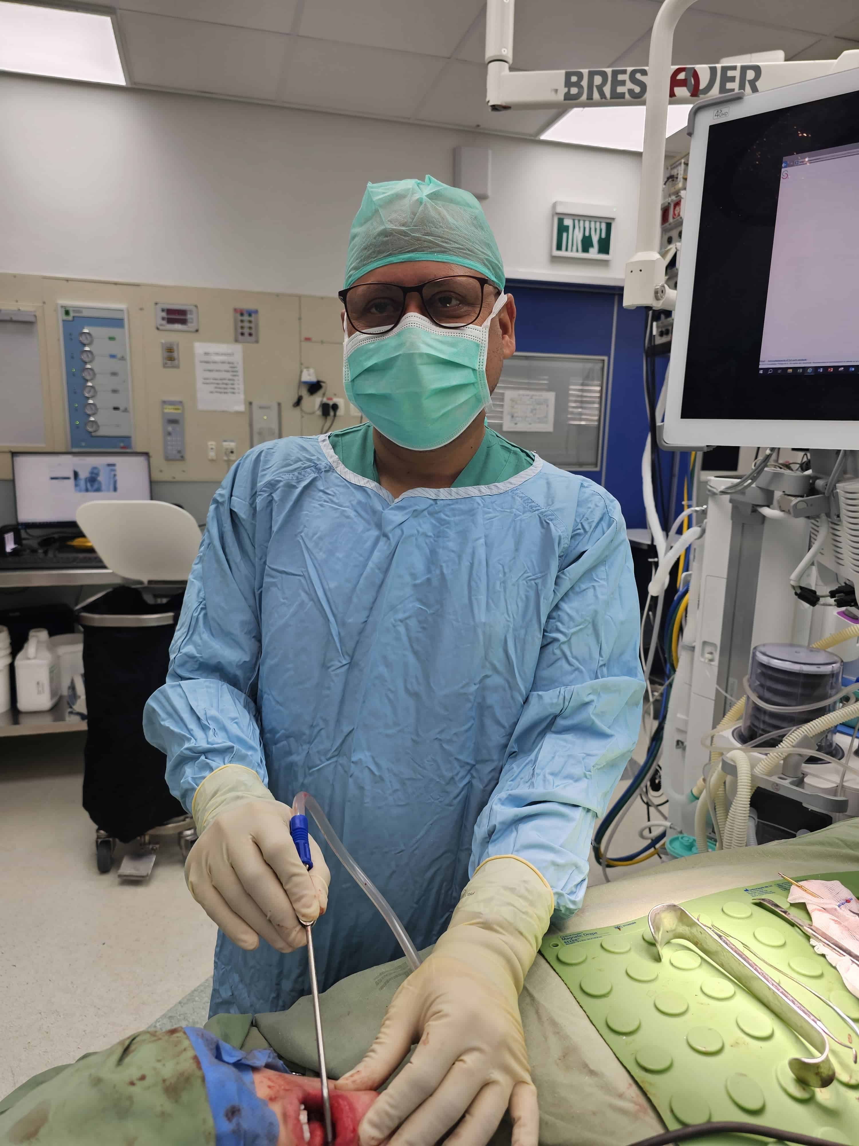 AO CMF fellow Prenit Kumar Pokharel performing surgery during fellowship