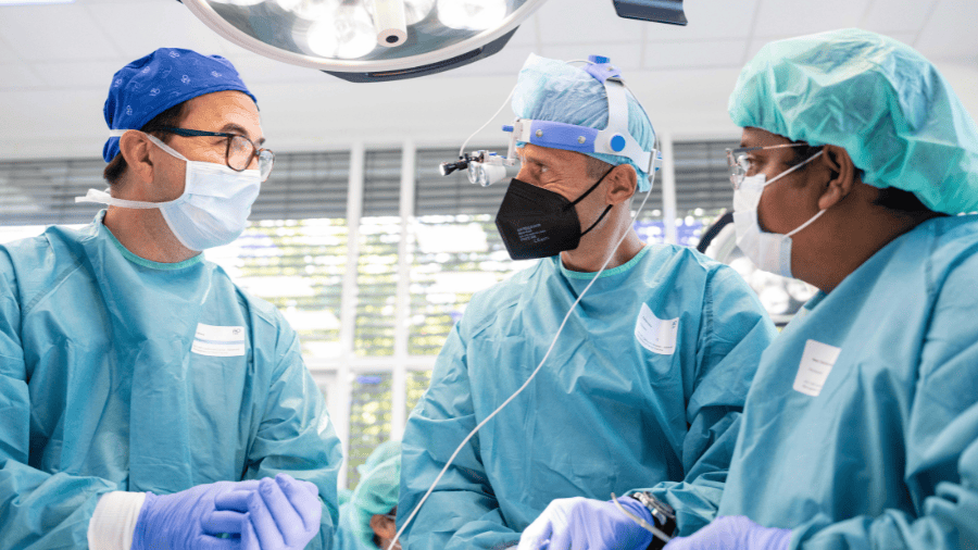 Surgeons Discussing Surgical Approaches and Techniques in Facial Surgery