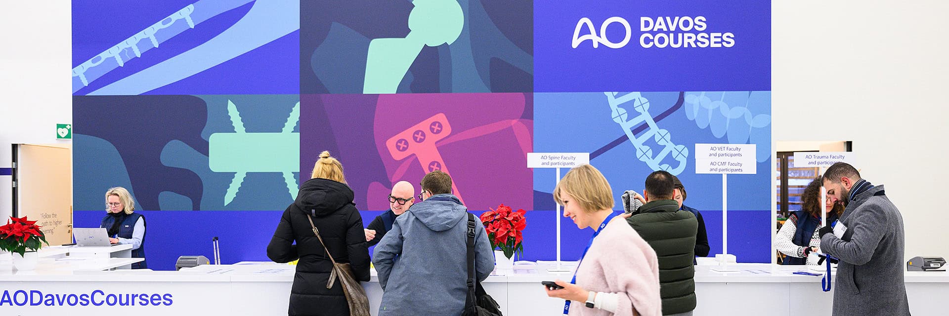 Participants at the welcome desk of the AO Davos courses - AO's premier educational event