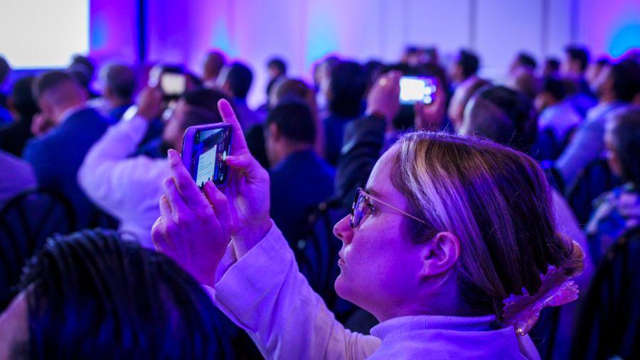 GSC 2025 audience taking photos with mobile phones 